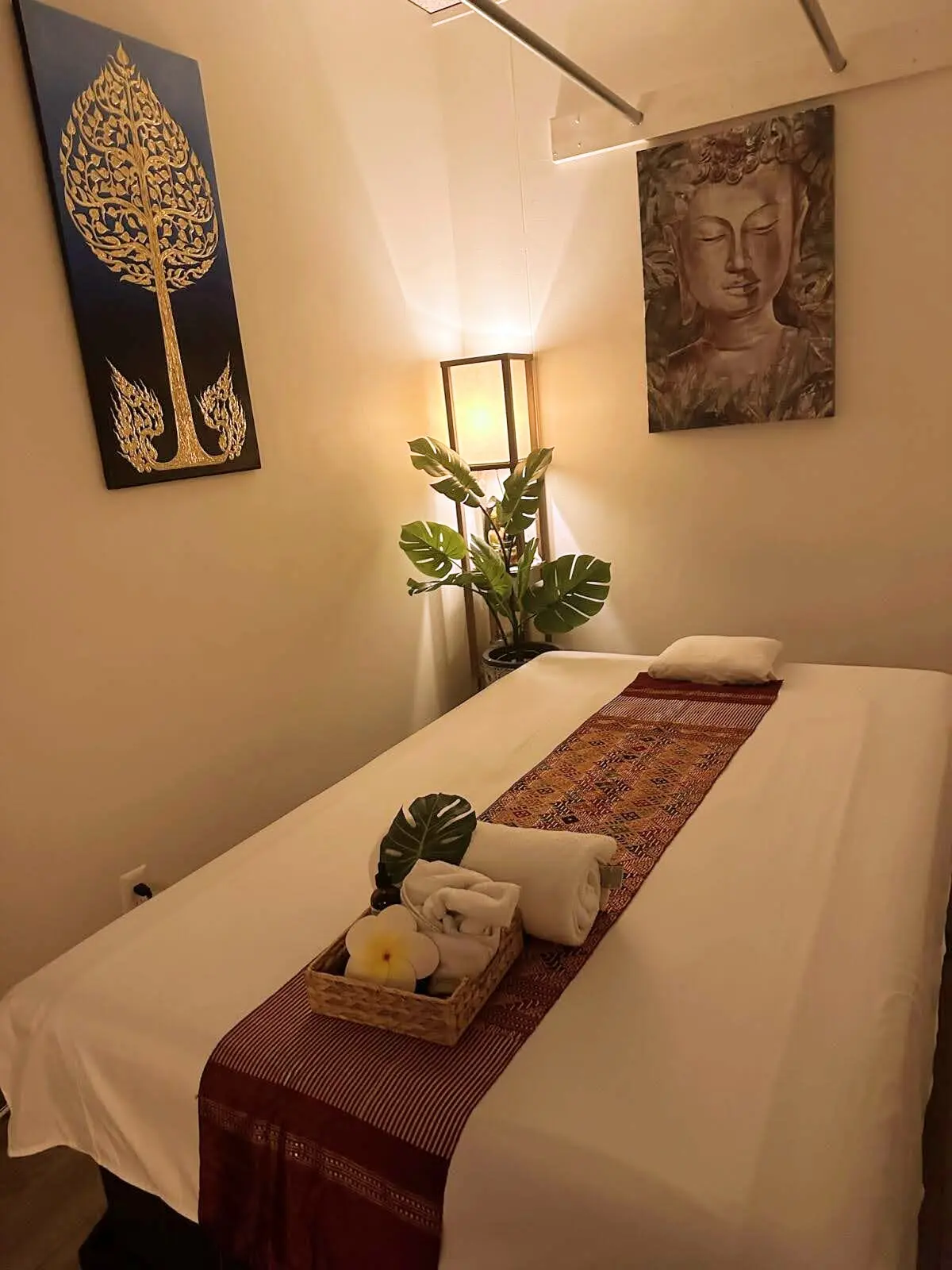 Softly lit massage room at Thai Herb Massage